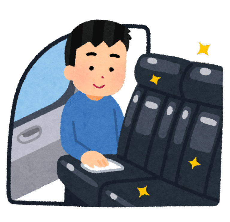 車内をそうじする男性。